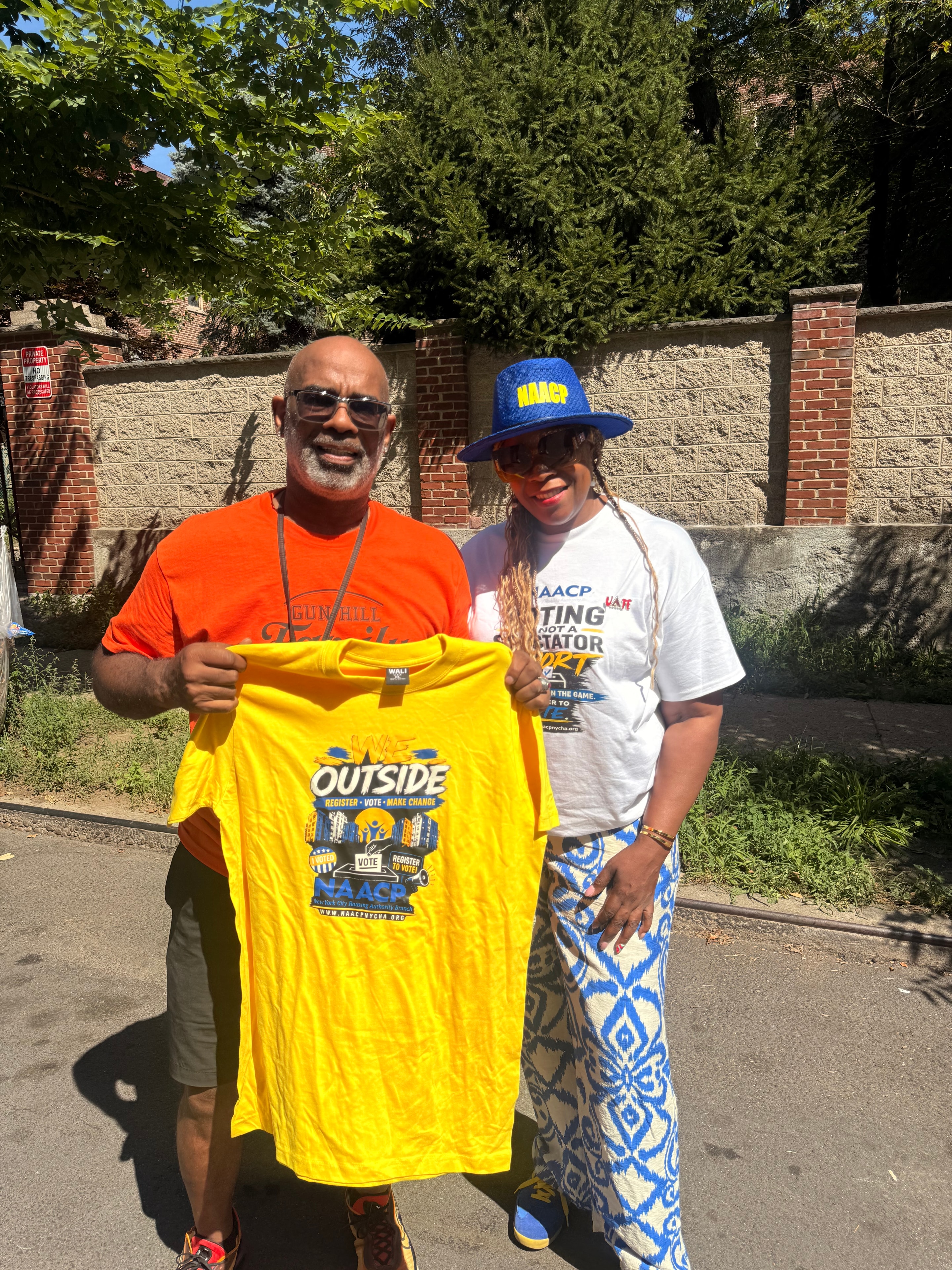 NAACP community members sharing voter outreach materials